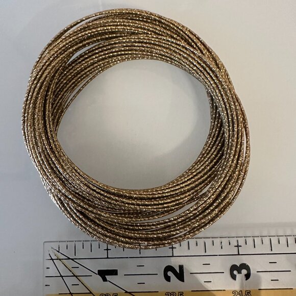 Multi-strand gold-toned wire bracelet - Picture 3 of 5